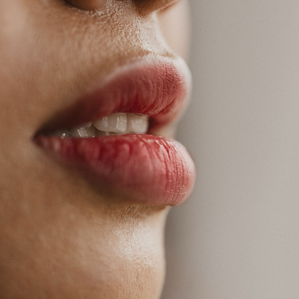 close upon white woman's full lips